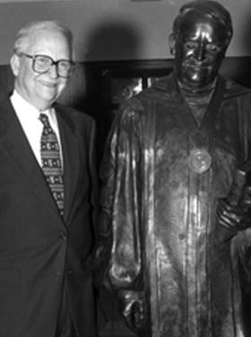 President Whiddon with statue made in his honor.